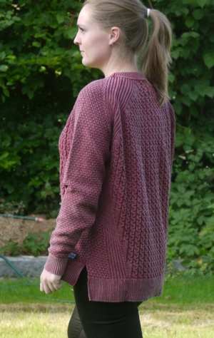 Dusty Burgundy Red Loose Fit Pullover with Knitted Cables for Women from Piece of Blue. On model. Back.