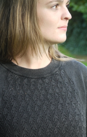 Simple and Elegant Black Grey O-Neck Pullover for Women from Piece of Blue. Close up.
