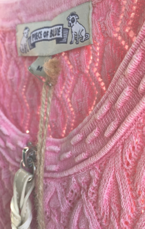 Pretty and Feminine Knitted Cardigan in soft Pink for Women from Piece of Blue. Close up 1.